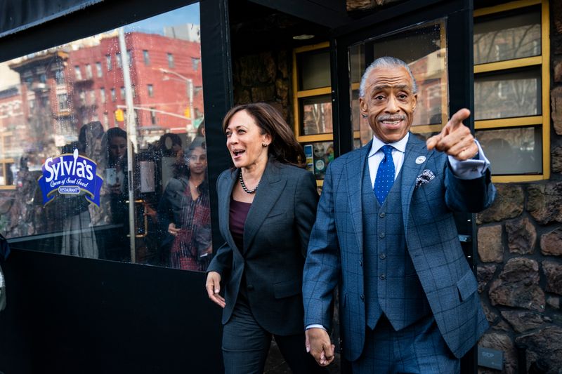 2020 Democratic presidential candidate Sen. Kamala Harris (D-CA) and Rev. Al Sharpton exit after having lunch at Sylvia’s Restaurant in Harlem, February 21, 2019 in New York City.